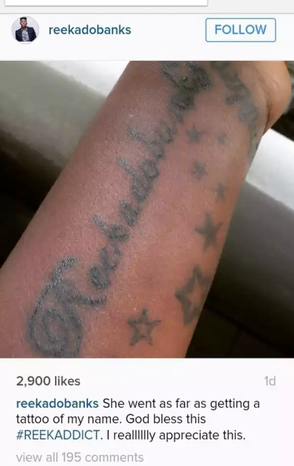 Photo: Reekado Banks & Fan Insult Each Other Over Tattoo Of His Name By Female Fan